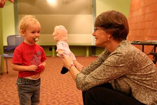 Hands on, hands in: Using puppets with young children